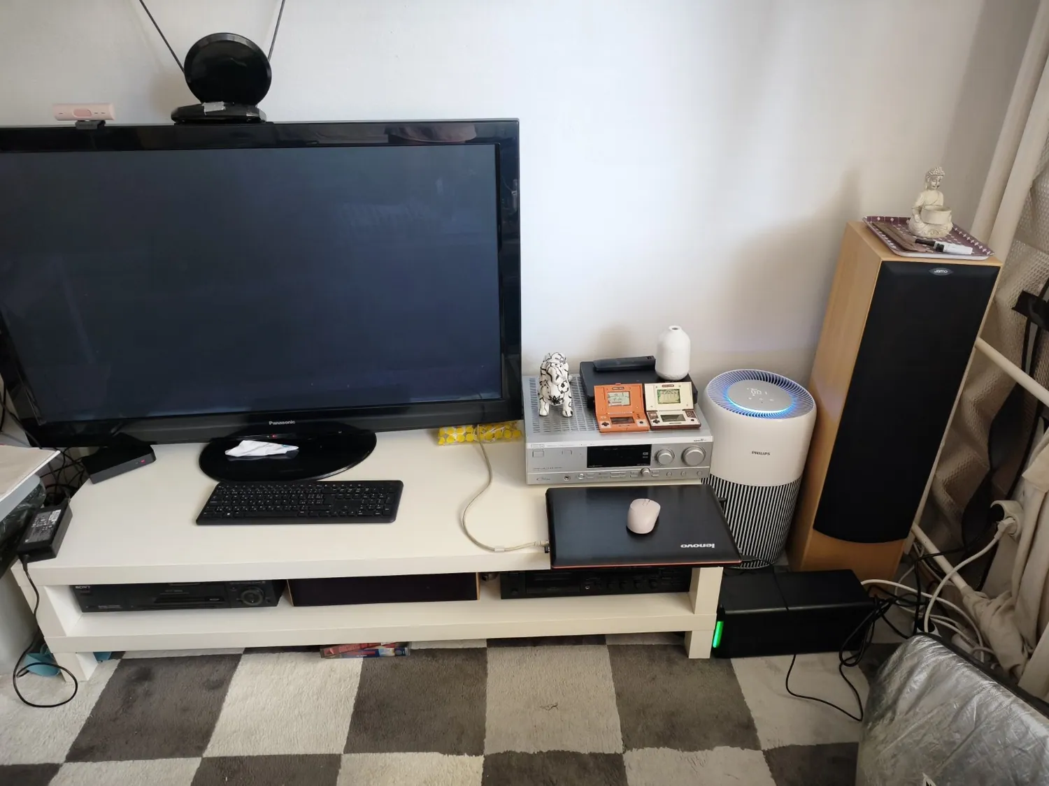 Living room · dark TV and audio chain