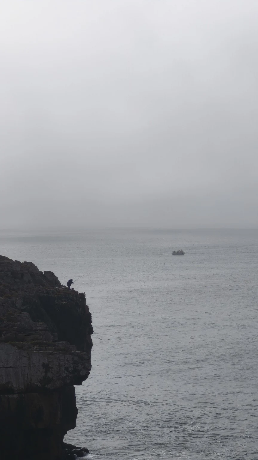At the edge of the ocean